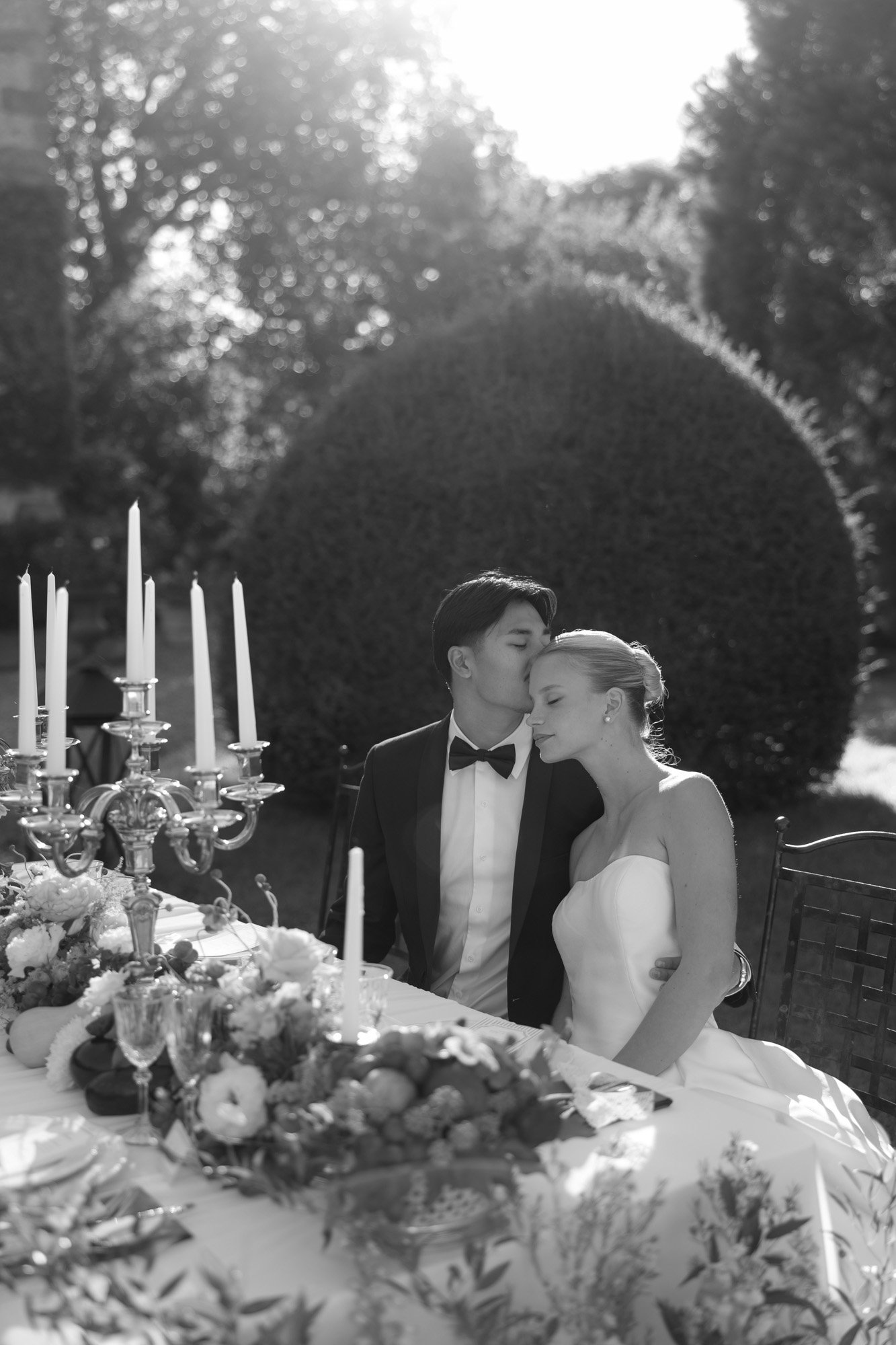 A man and woman sitting at a table.